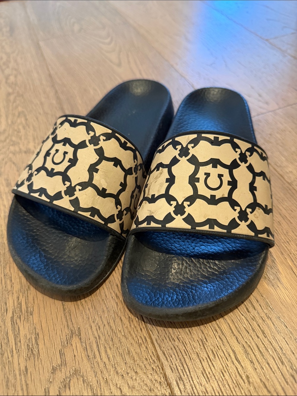 Salvatore Ferragamo Black and Gold Logo Slide Sandals